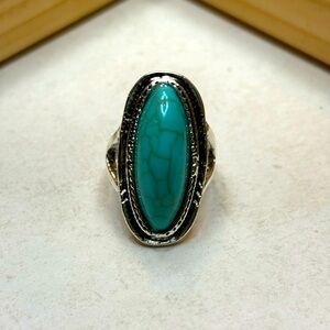 Woman’s silver ring with turquoise accent
